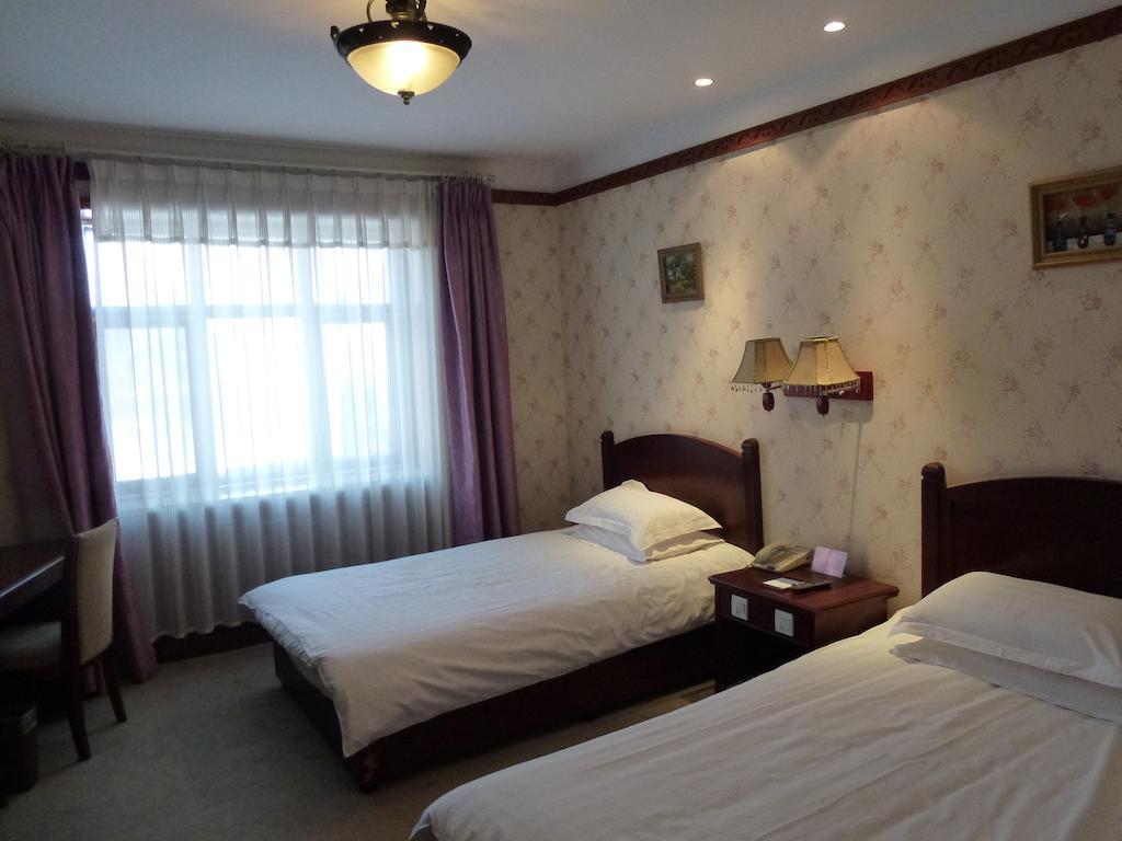 Hotel Harbin Volgamanor Acheng Habitación foto