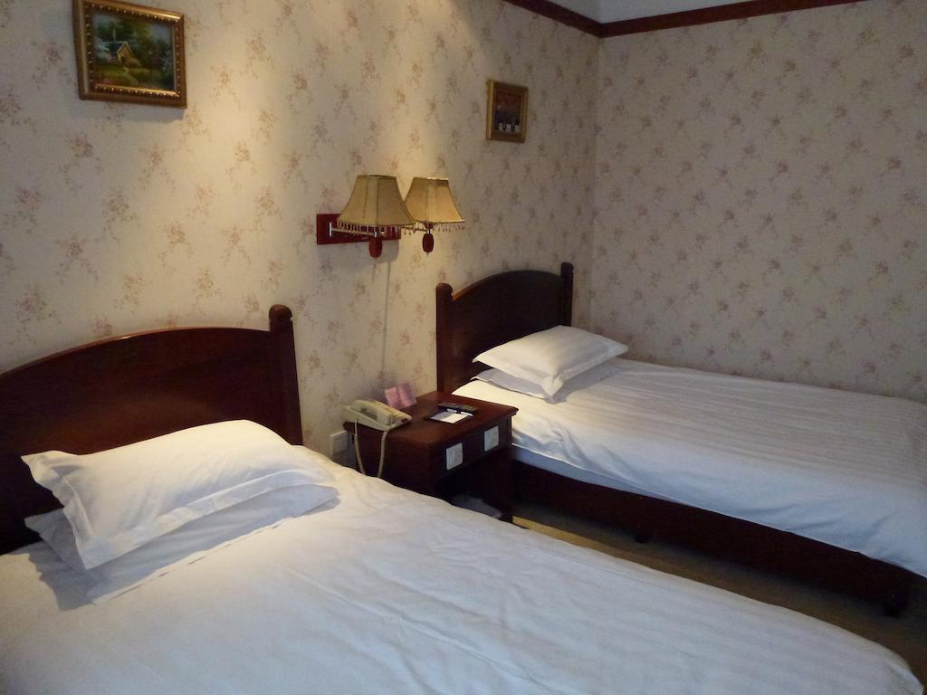 Hotel Harbin Volgamanor Acheng Habitación foto