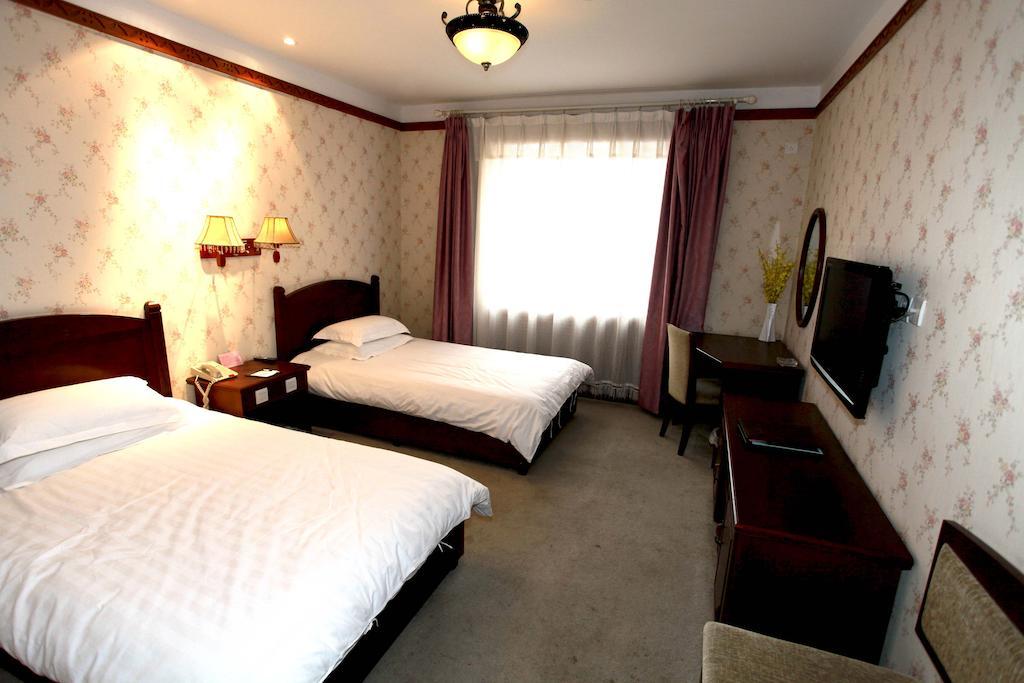 Hotel Harbin Volgamanor Acheng Habitación foto